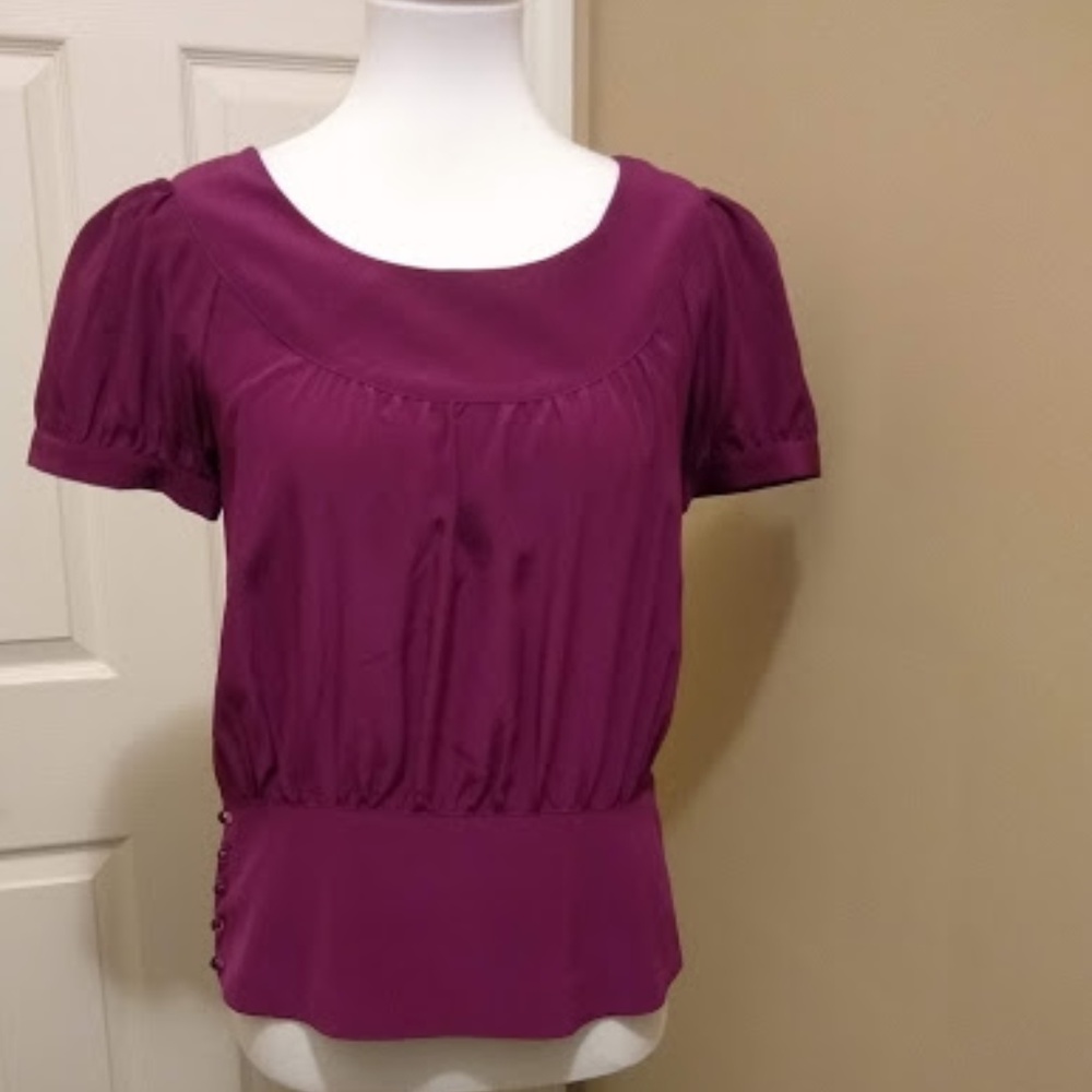 Fossil size medium top in nice plum color